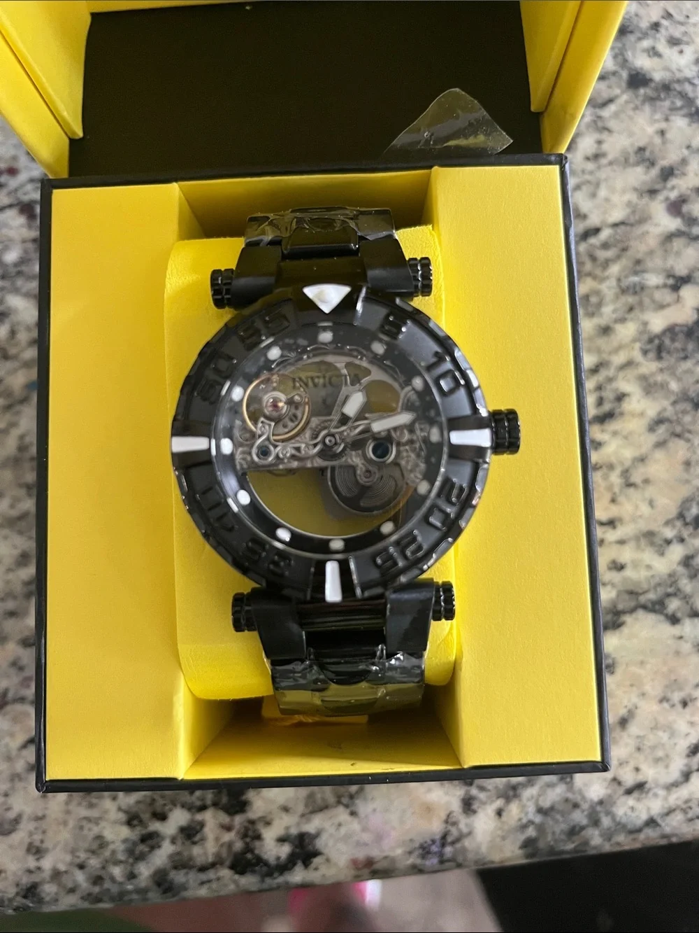 Invicta Black Skeleton Dial Men's Bracelet Watch with Silver Movement Accents